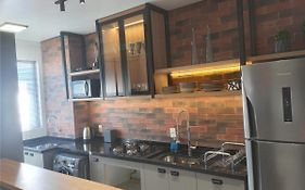 Apartamento SOHO - perto da WEG